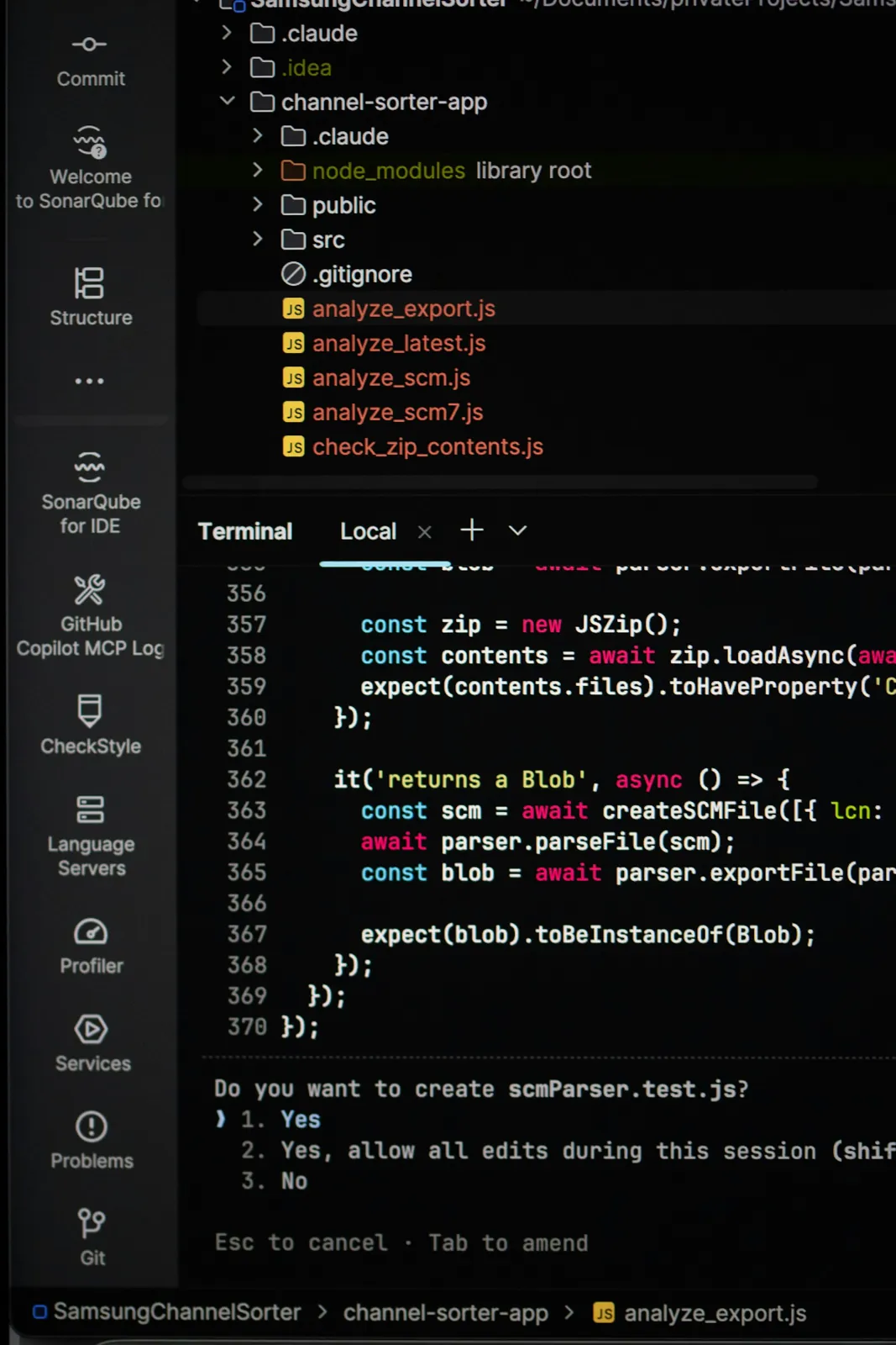 Code in a dark-themed editor with a terminal prompt asking to create a file, options Yes or No